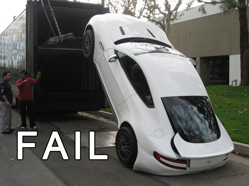 Illustration for article titled This Is Not The Proper Way To Unload An Aston Martin